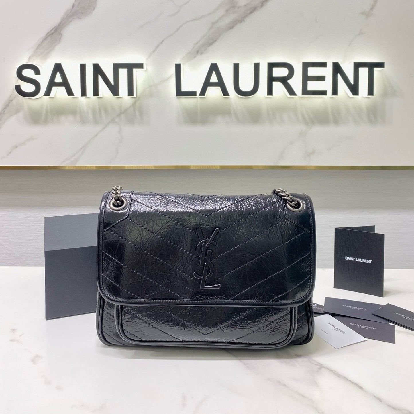 MEDIUM NIKI 28 IN BLACK CALFSKIN CHAIN BAG High-end