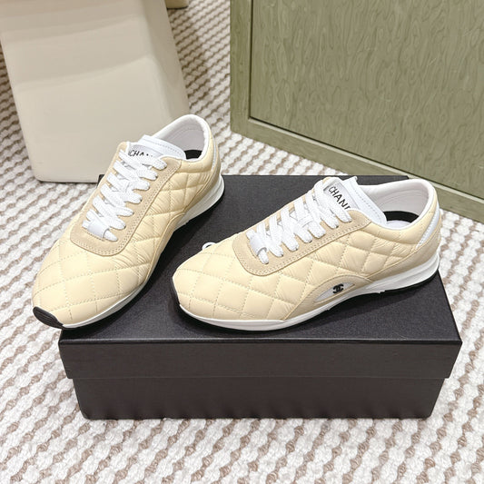 CHANEL 25S SNEAKERS IN LIGHT YELLOW CALFSKIN AND SUEDE