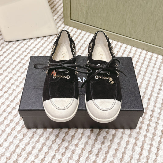 CHANEL 25S MOASINS IN BLACK AND LIGHT GREY SUEDE